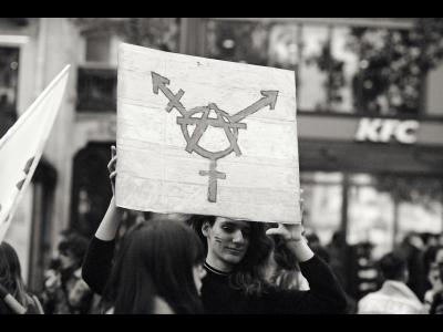 People with trans symbol on placard